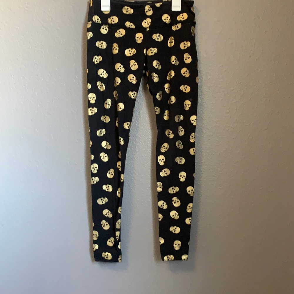 Cotton leggings with gold skulls